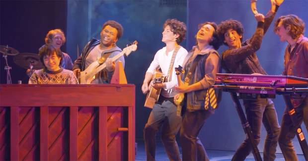 Actors showcasing their talent in a live performance on a stage.