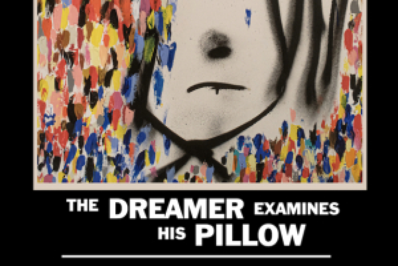 the dreamer examines his pillow logo 98772