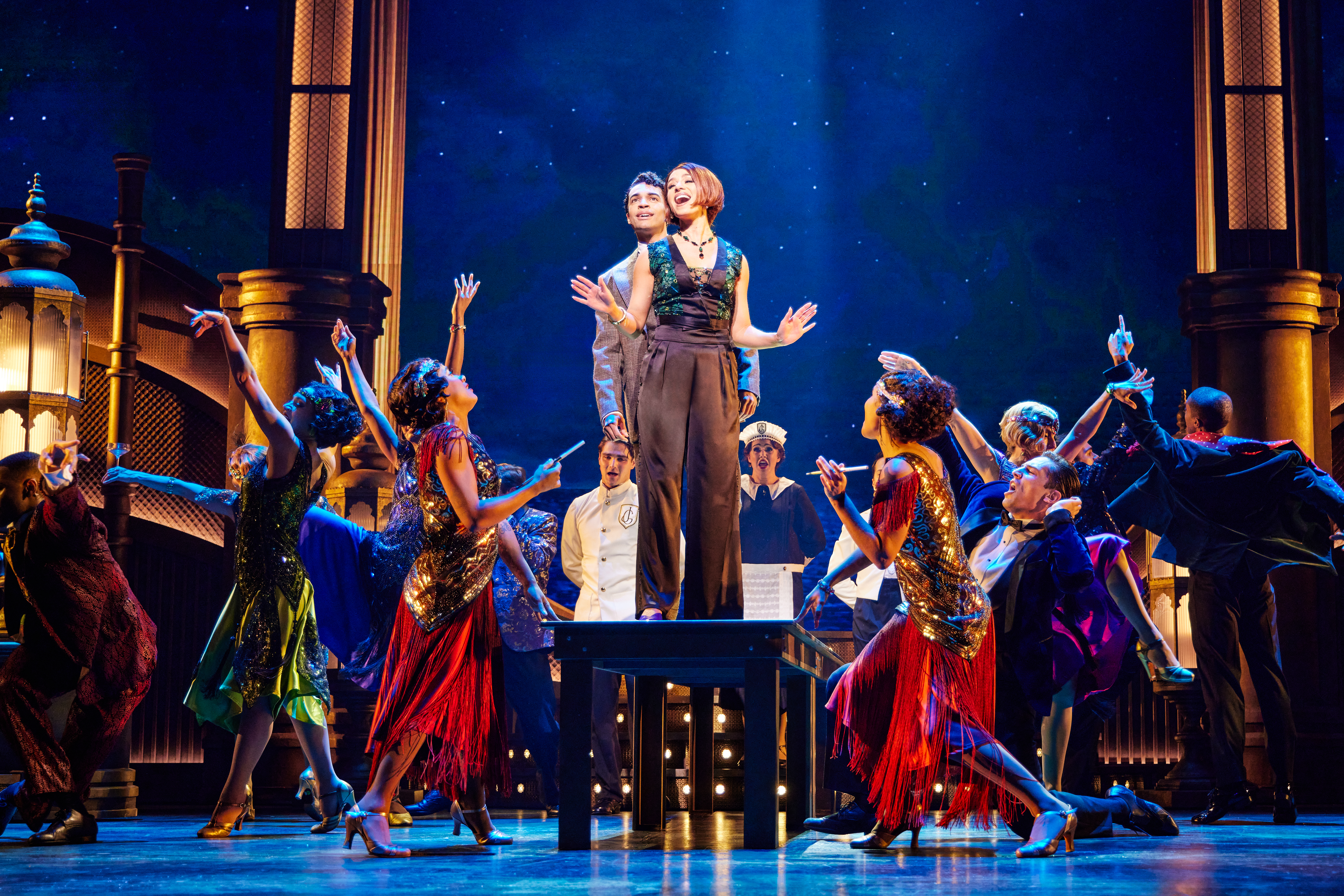 Noah J. Ricketts as Nick Carraway, Samantha Pauly as Jordan Baker in Paper Mill Playhouse's The Great Gatsby, directed by Marc Bruni. ©Jeremy Daniel Noah J. Ricketts as Nick Carraway, Samantha Pauly as Jordan Baker in Paper Mill Playhouse's The Great Gatsby, directed by Marc Bruni. ©Jeremy Daniel