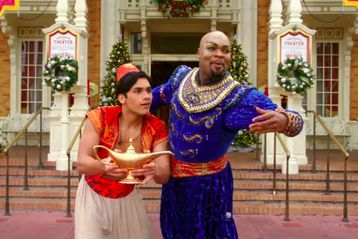 Adi Roy and Michael James Scott at the 40th Anniversary Disney Parks Magical Christmas Day Parade