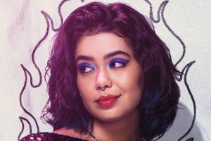 Interview: In <i>Mean Girls</i> Movie-Musical, Auli'i Cravalho Breaks the Mold as Janis