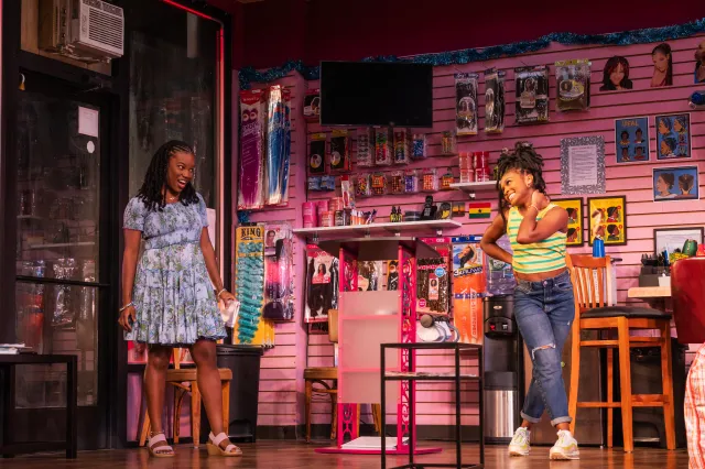 Brittany Adebumola and Dominique Thorne in <i>Jaja's African Hair Braiding</i> on Broadway