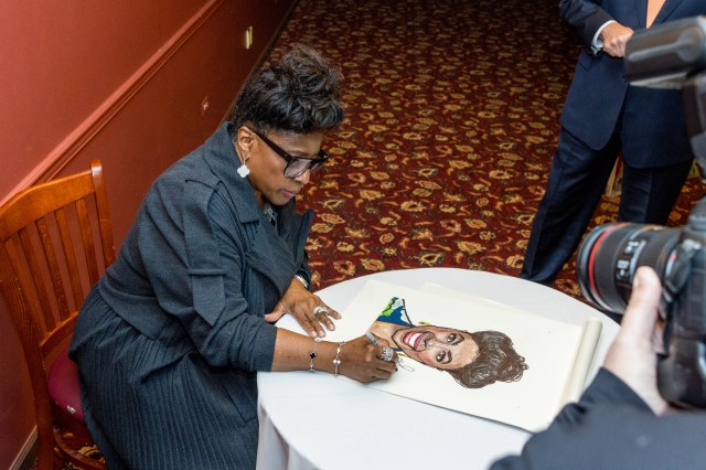 LaTanya Richardson Jackson signs Sardi's portrait