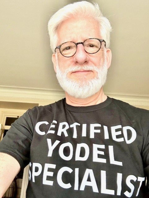 Dan Moses Schreier was gifted a "certified yodel specialist" shirt on opening night by the sound crew