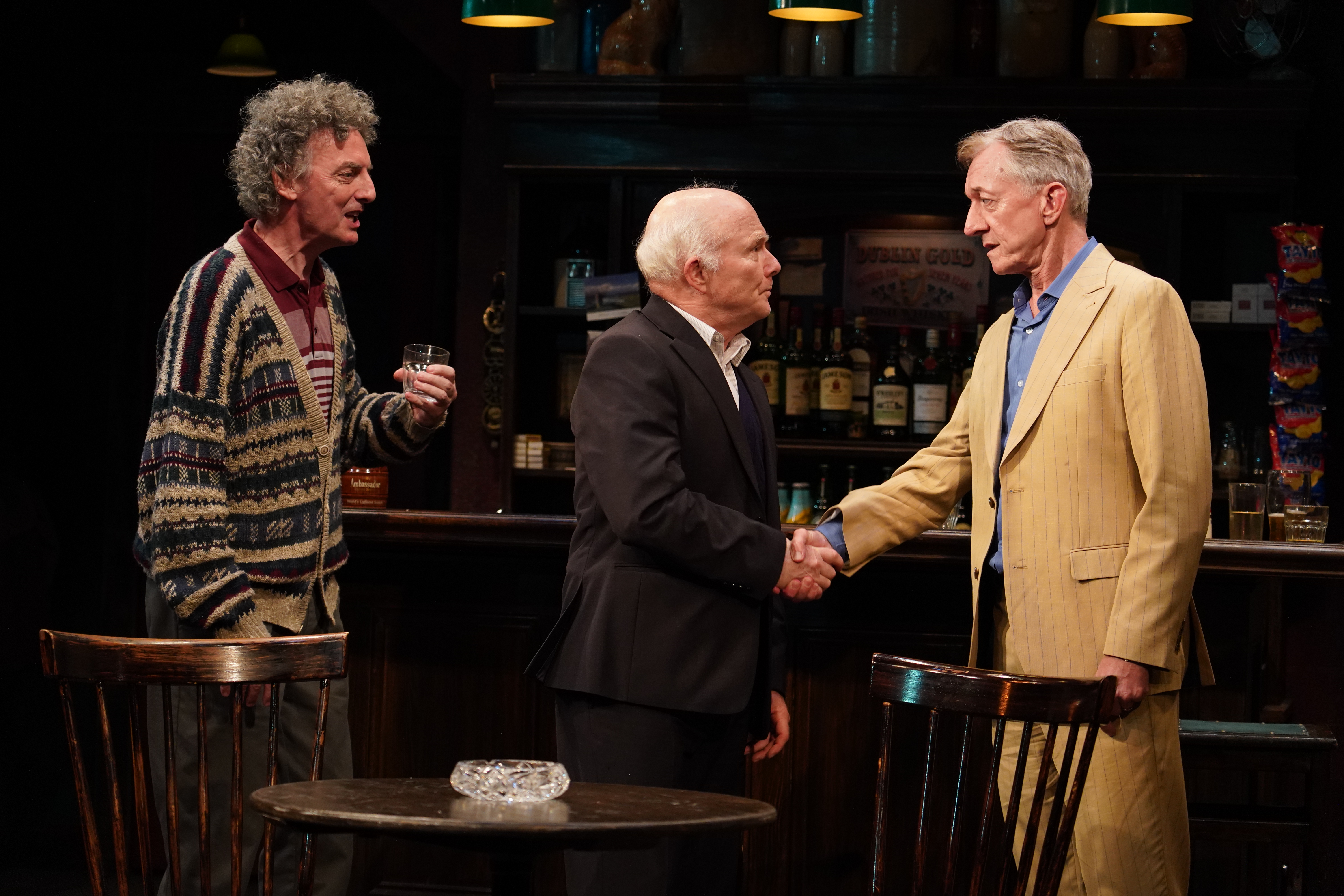 John Keating, Dan Butler, and Sean Gormley in Irish Rep's 2025 production of <i>The Weir</i><br>(© Carol Rosegg)