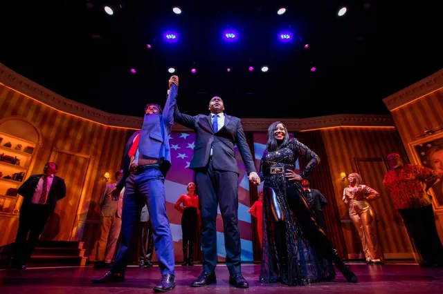 (L to R): Chad Doreck as Joe Biden, T.J. Wilkins as Barack Obama, and Shanice as Michelle Obama with the cast of <i>44—The Musical</i> (© Bella Marie Adams)