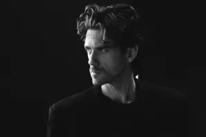 Listen: Aaron Tveit and Chess Company Sing “One Night in Bangkok”