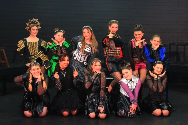 Event Logo: SIX From Left to Right Front Row Maeve McEvoy Genevra Bojador Pippa Diaz Adrienne Gabriel Nicole Sample From Left to Right Back Row Harper Smith Theodora Hoyle Sophia Duncan Violet Zenoff Kensie Williams Tess Motschall