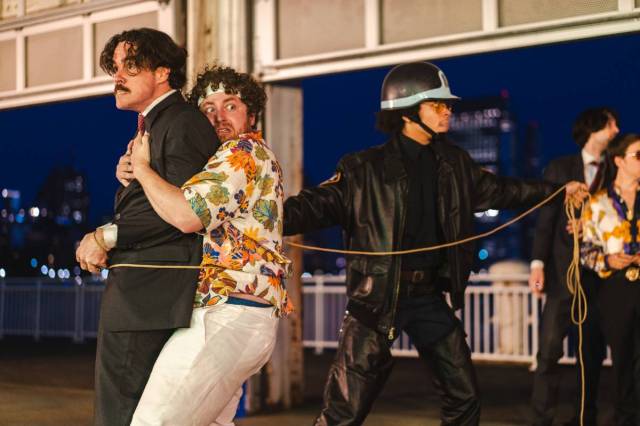 John Paul Harkins, James Soller, and Marc Laurent Plaskett in <i>The Comedy of Errors</i> (© Ellie Gravitte) John Paul Harkins, James Soller, and Marc Laurent Plaskett in <i>The Comedy of Errors</i> (© Ellie Gravitte)
